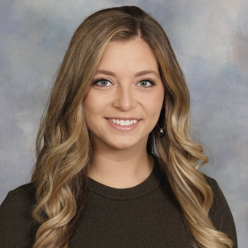 Woman with long hair smiling