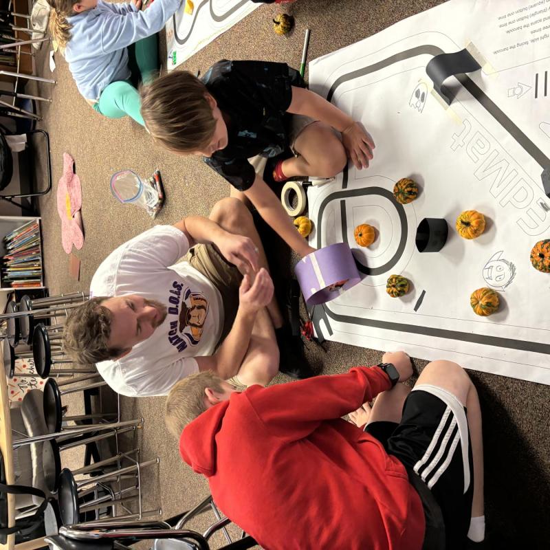 Students working with robots