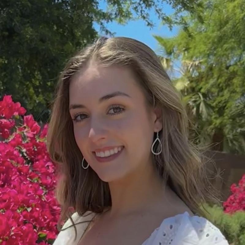 woman with brown hair smiling 