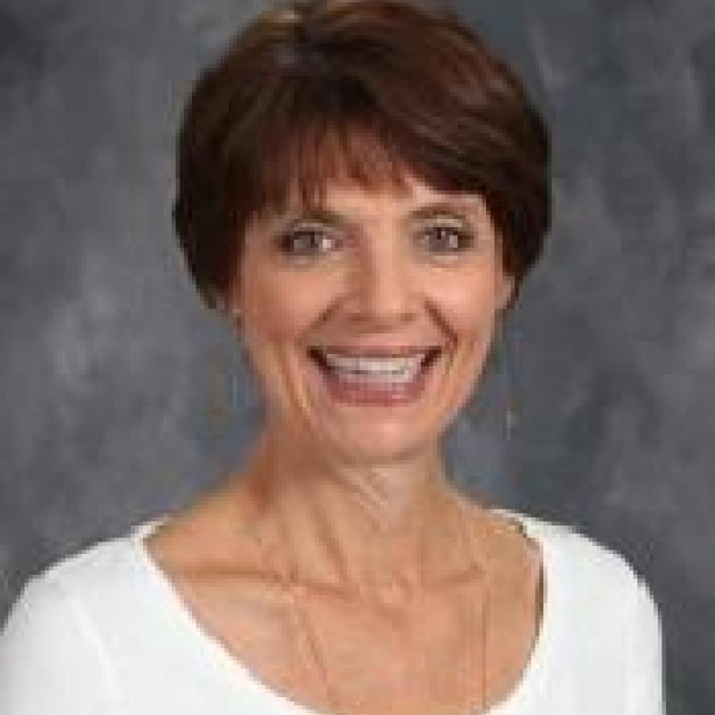 a women in a white top